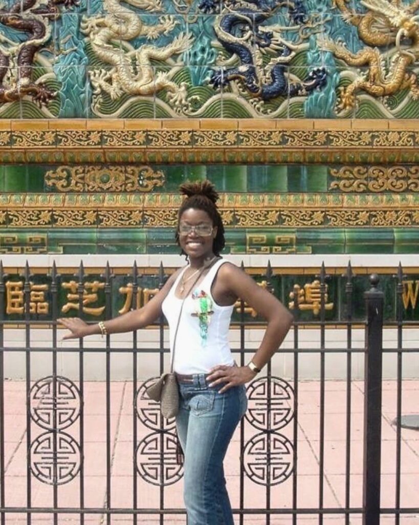 Andrea posed in front of the Chinatown Sign in Chicago