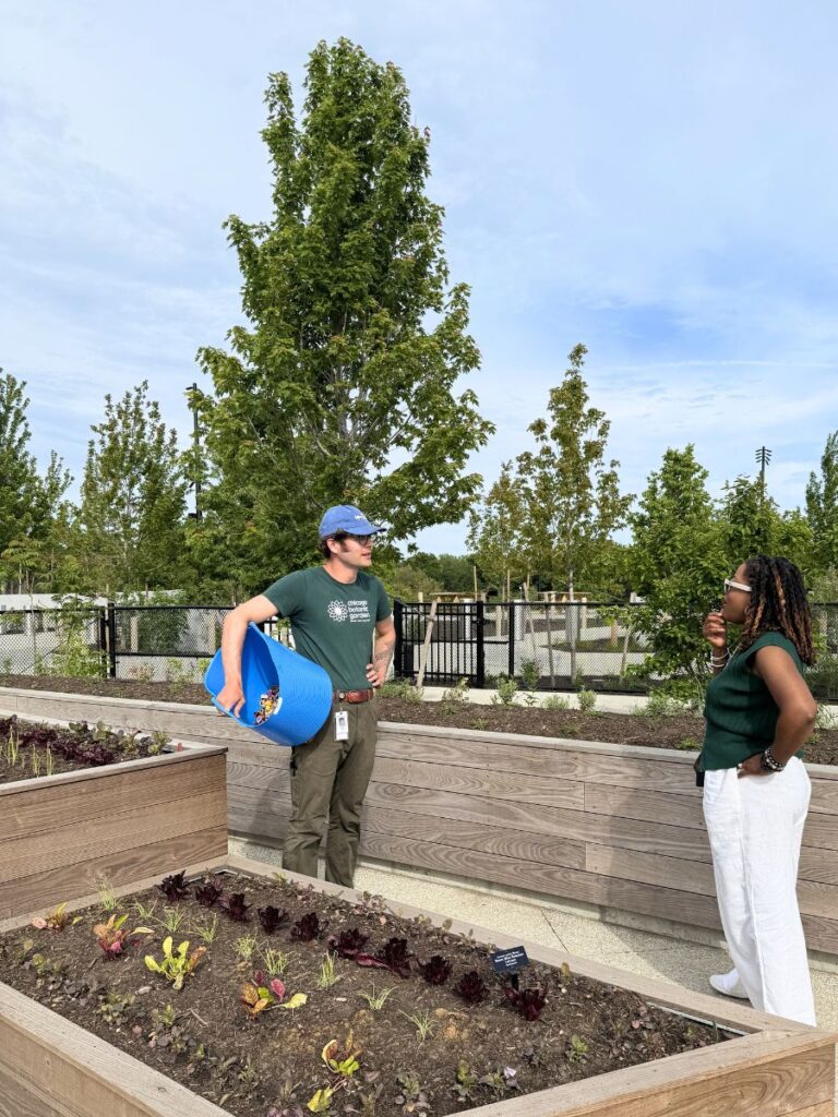 photo-of-gardeners-speaking in Obama center-garden